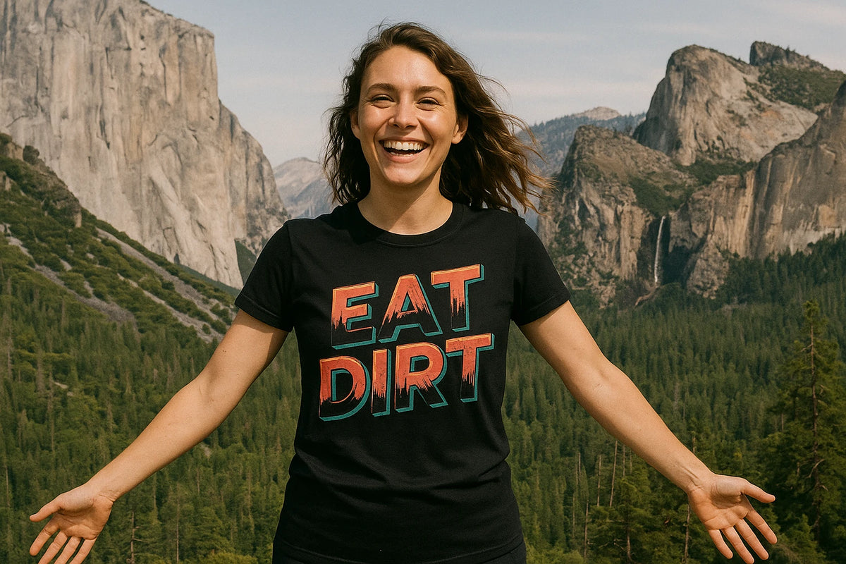 Lifestyle shot of the "Eat Dirt" black trail running shirts in a real-world setting