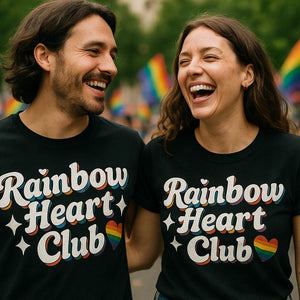 Person wearing the black lgbtq pride t shirt graphic tee - "Rainbow Heart Club" design
