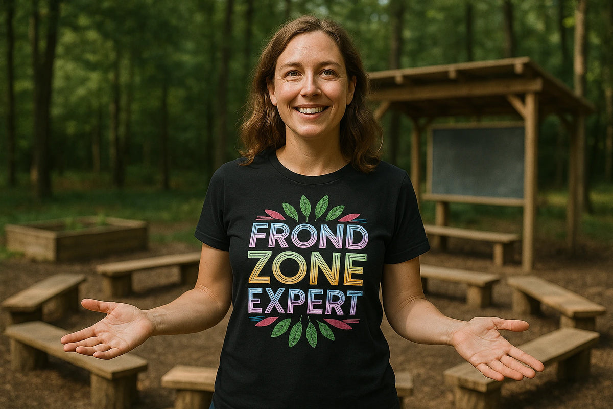 Lifestyle shot of the "Frond Zone Expert" black botany t shirt in a real-world setting