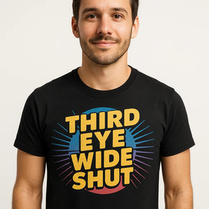 Close-up of the "Third Eye Wide Shut" gold print on a premium Bella+Canvas black t shirt meditation
