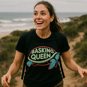 Lifestyle shot of the "Basking Queen" black turtle tee in a real-world setting