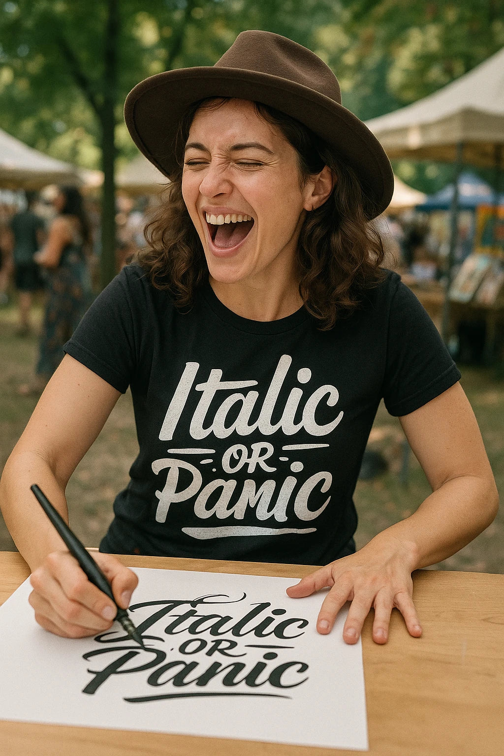 "Italic Or Panic" black calligraphy shirts, photographed as gifts for calligraphy lovers