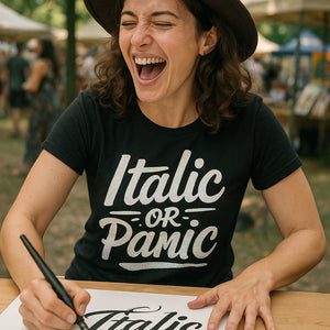 "Italic Or Panic" black calligraphy shirts, photographed as gifts for calligraphy lovers