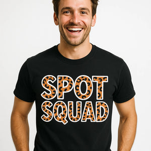 Close-up of the "Spot Squad" white print on a premium Bella+Canvas black leopard shirts