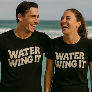 Person wearing the black swimming shirts graphic tee - "Water Wing It" design