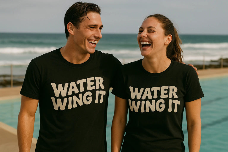 Person wearing the black swimming shirts graphic tee - 