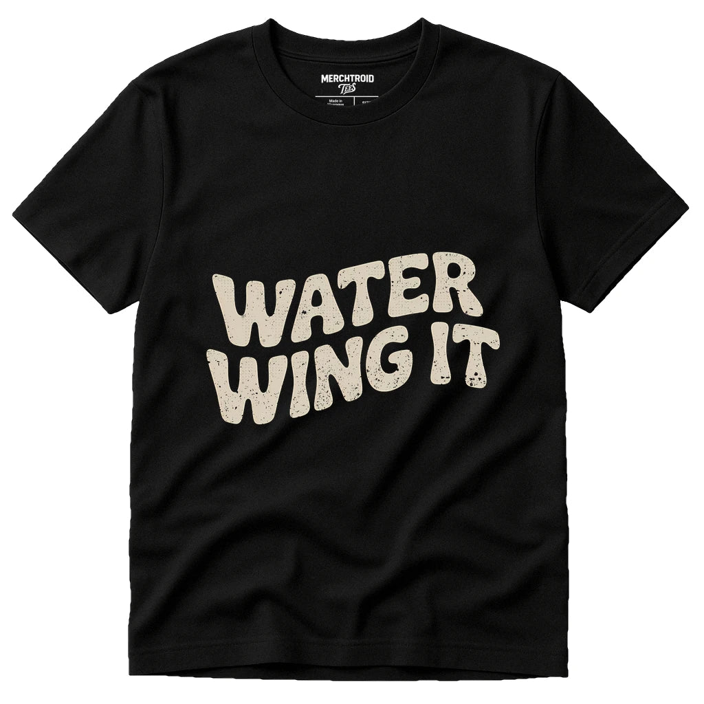 Black Swimming Shirts - "Water Wing It" graphic tee with beige print, flat lay product photo