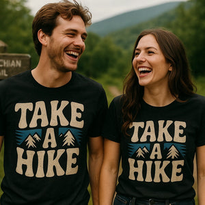 Person wearing the black shirts for trekking graphic tee - "Take a Hike" design