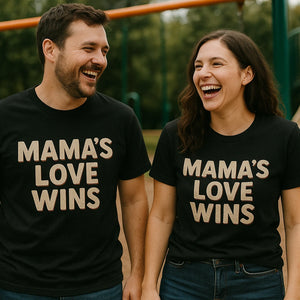 Person wearing the black t shirt mom life graphic tee - "Mama'S Love Wins" design