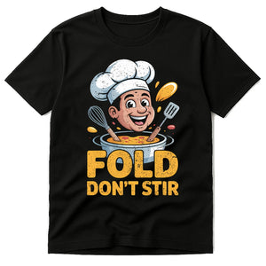 Black Cooking T Shirt - "Fold Don'T Stir" graphic tee with gold print, flat lay product photo