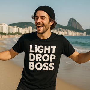 Lifestyle shot of the "Light Drop Boss" black men's new years eve shirts in a real-world setting