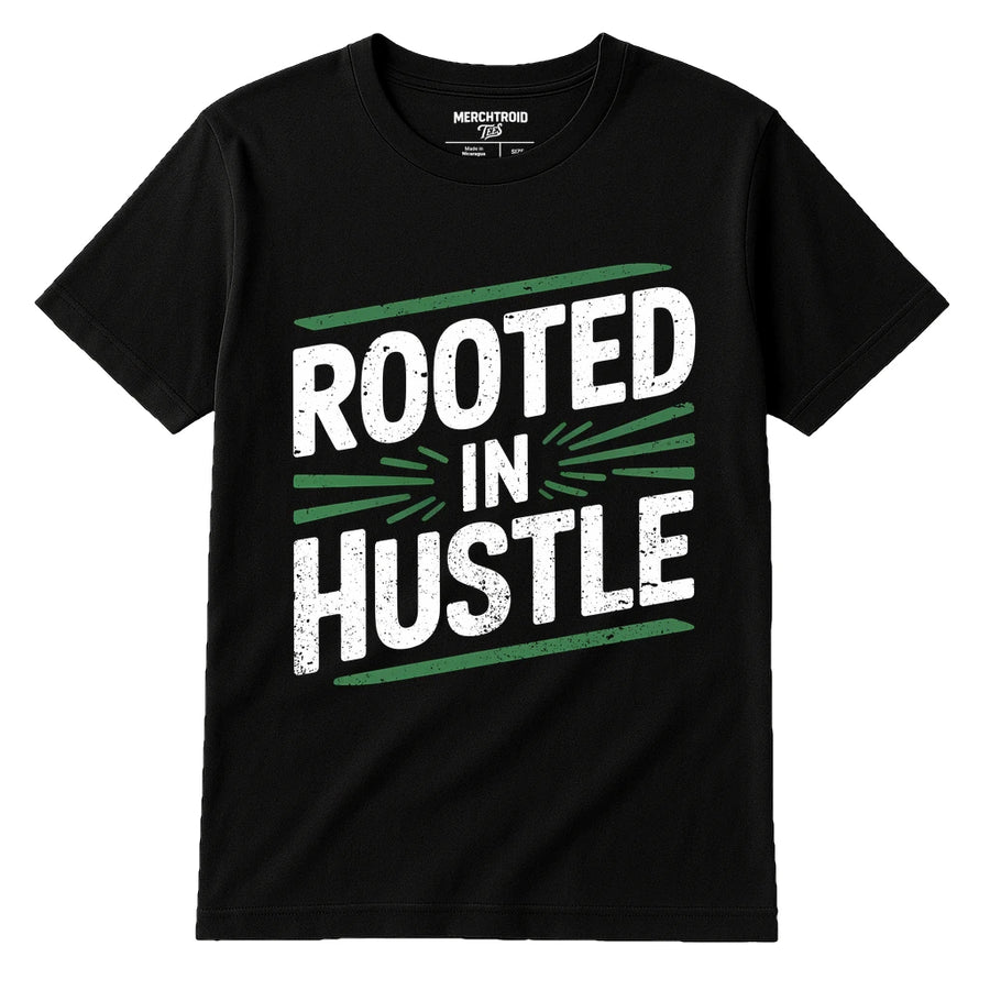 A black T-shirt with bold white and green text that says "ROOTED IN HUSTLE" across the front. The text is arranged diagonally with decorative lines. There is no person visible in the image.