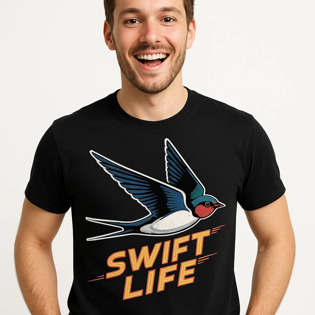 Close-up of the "Swift Life" tan print on a premium Bella+Canvas black i swallow t shirt