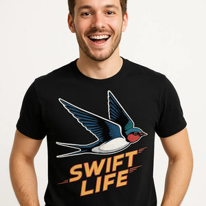 Close-up of the "Swift Life" tan print on a premium Bella+Canvas black i swallow t shirt