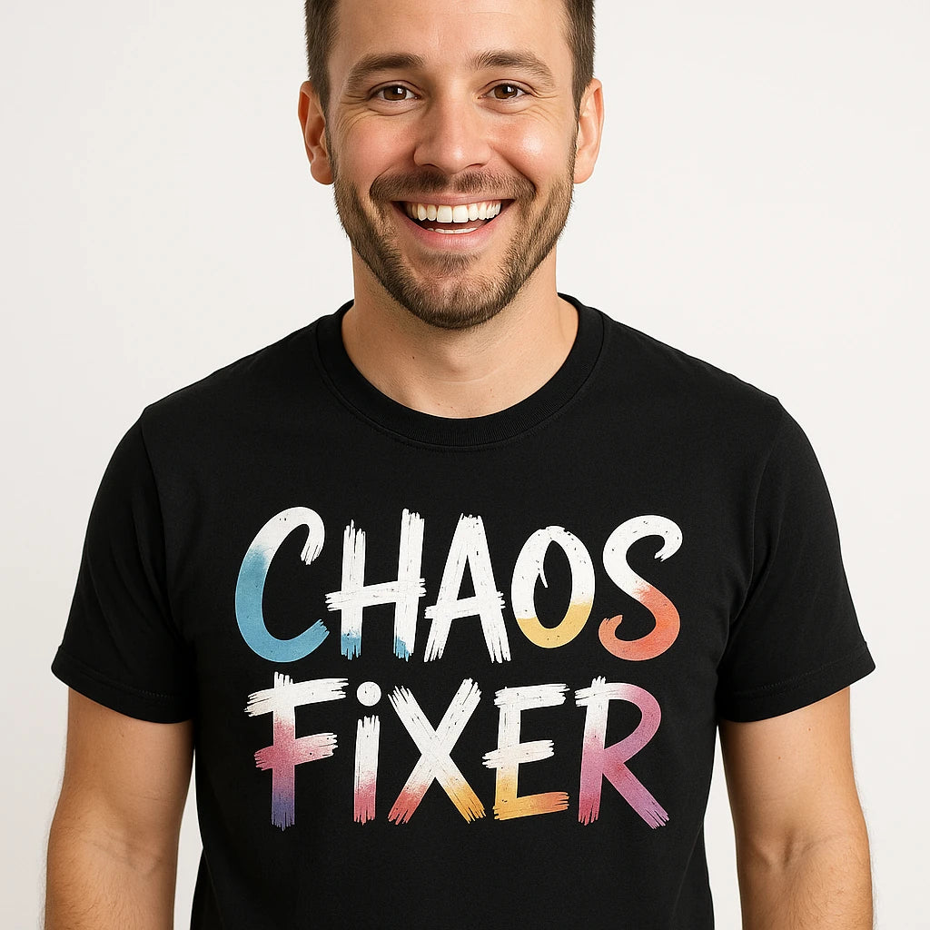Close-up of the "Chaos Fixer" white print on a premium Bella+Canvas black social worker t shirt