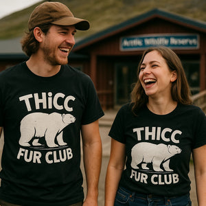 Person wearing the black polar bear shirts graphic tee - "Thicc Fur Club" design