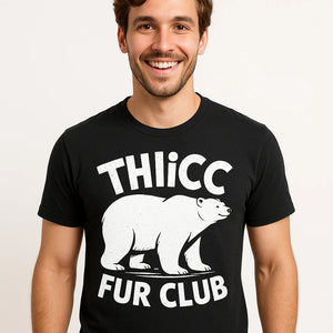 Close-up of the "Thicc Fur Club" white print on a premium Bella+Canvas black polar bear shirts