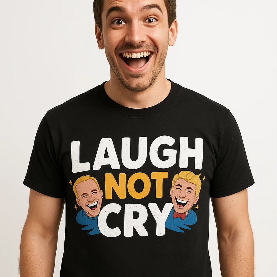 A person with an enthusiastic expression is wearing a black T-shirt with the text "LAUGH NOT CRY" printed on it. The shirt also features illustrations of a smiling person with a bow tie, surrounded by small stars.