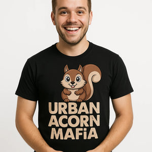 Close-up of the "Urban Acorn Mafia" beige print on a premium Bella+Canvas black t shirt squirrel