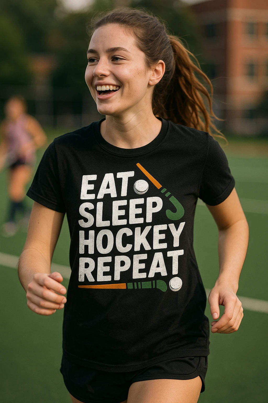 "Eat Sleep Hockey Repeat" black field hockey tee shirts, photographed as gifts for field hockey lovers