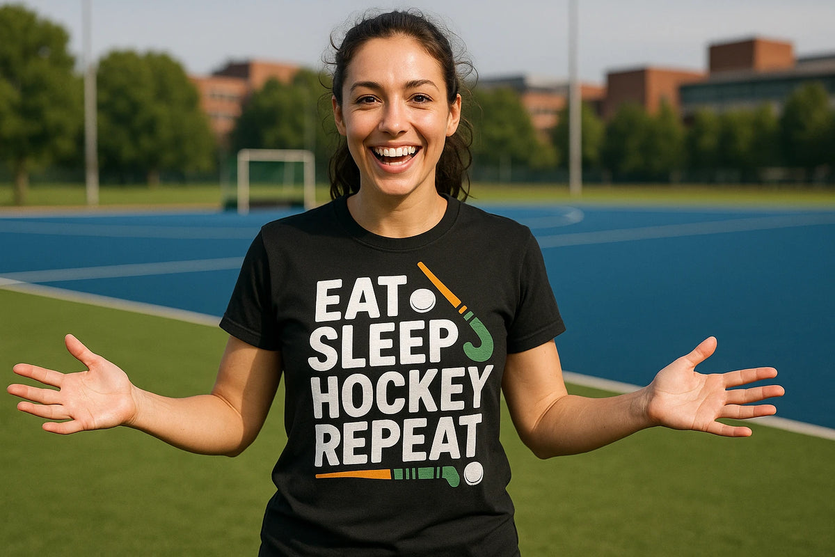 Lifestyle shot of the "Eat Sleep Hockey Repeat" black field hockey tee shirts in a real-world setting