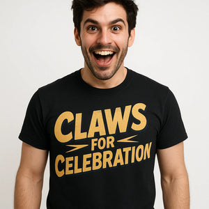 Close-up of the "Claws for Celebration" gold print on a premium Bella+Canvas black monster t shirt