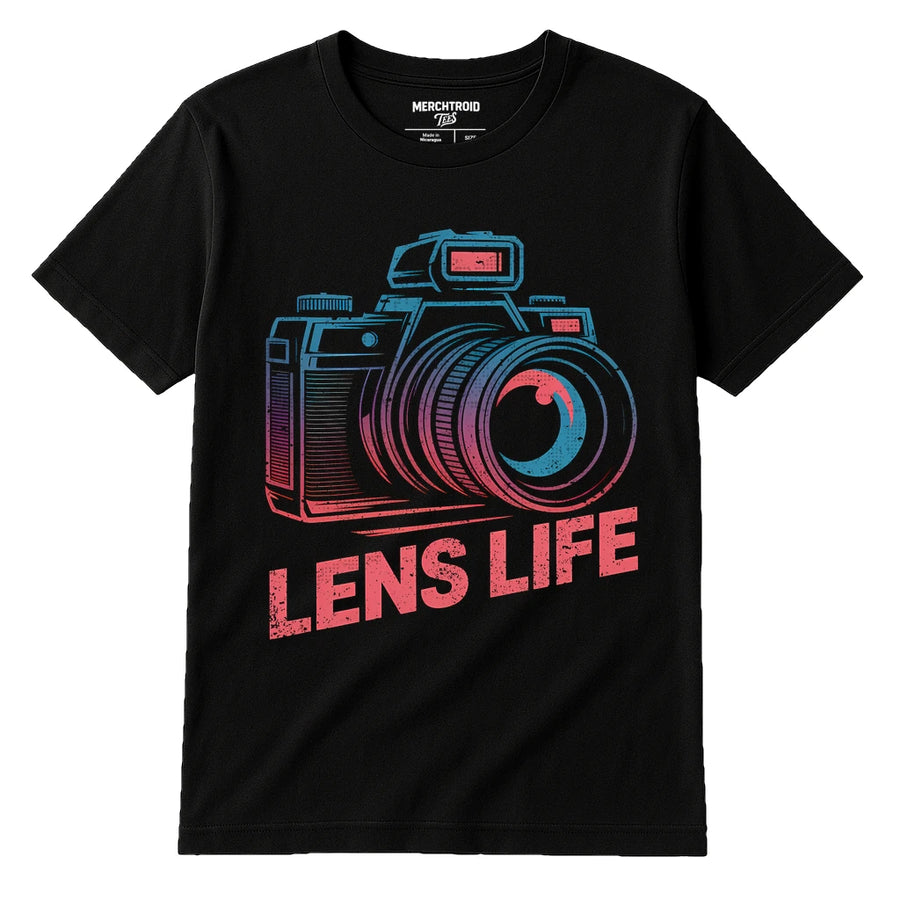 A black t-shirt with a colorful graphic of a vintage camera. The words "LENS LIFE" are printed beneath the camera in a bold, distressed font.