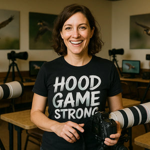 Lifestyle shot of the "Hood Game Strong" black falcon t shirt in a real-world setting