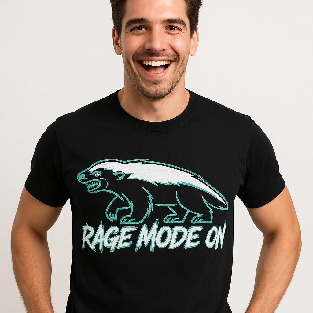 Close-up of the "Rage Mode On" gray print on a premium Bella+Canvas black honey badger t shirt