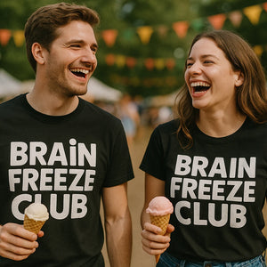 Person wearing the black cream t shirt graphic tee - "Brain Freeze Club" design