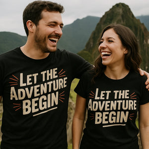 Person wearing the black adventure travel shirts graphic tee - "Let the Adventure Begin" design