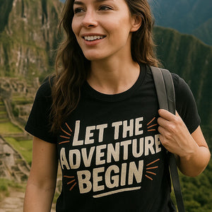 "Let the Adventure Begin" black adventure travel shirts, photographed as adventure travel lover gift