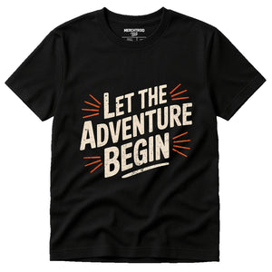 Black Adventure Travel Shirts - "Let the Adventure Begin" graphic tee with cream print, flat lay product photo
