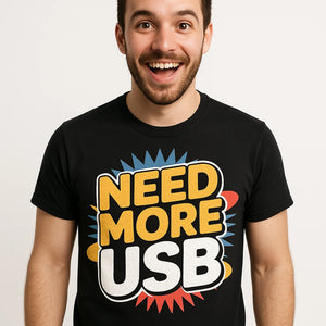 Close-up of the "Need More Usb" gold print on a premium Bella+Canvas black gadget shirts