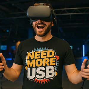 Lifestyle shot of the "Need More Usb" black gadget shirts in a real-world setting
