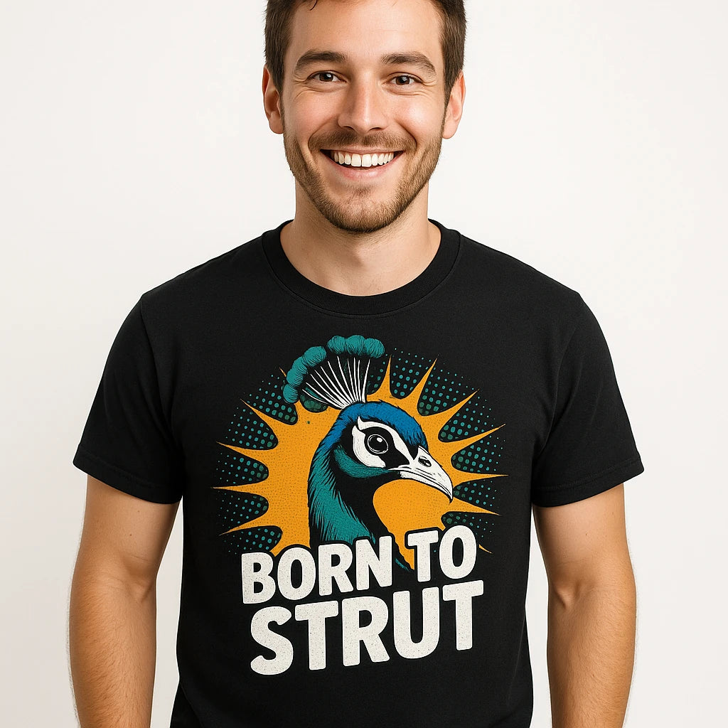 Close-up of the "Born To Strut" gold print on a premium Bella+Canvas black peacock shirts
