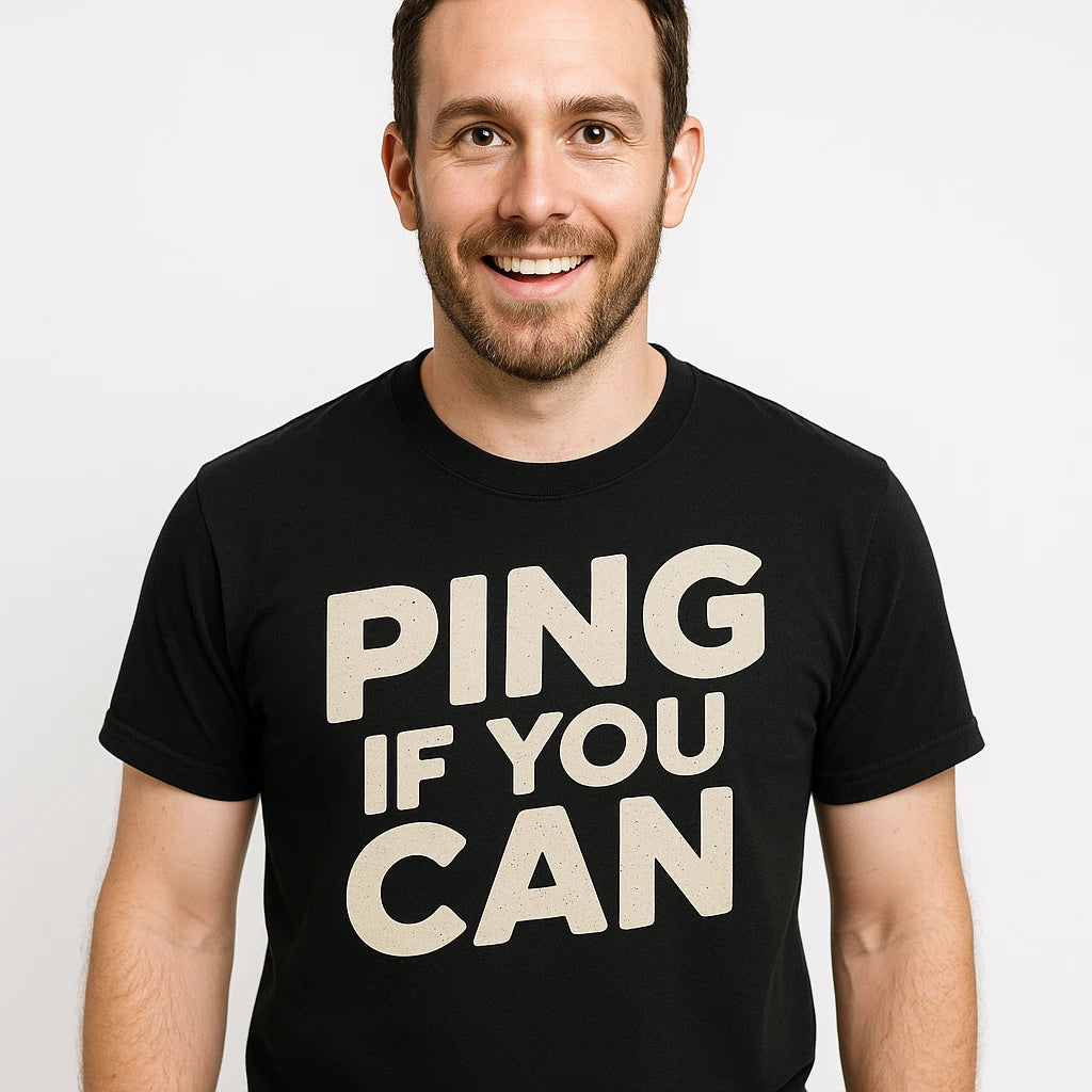 Close-up of the "Ping If You Can" beige print on a premium Bella+Canvas black submarine tee shirts