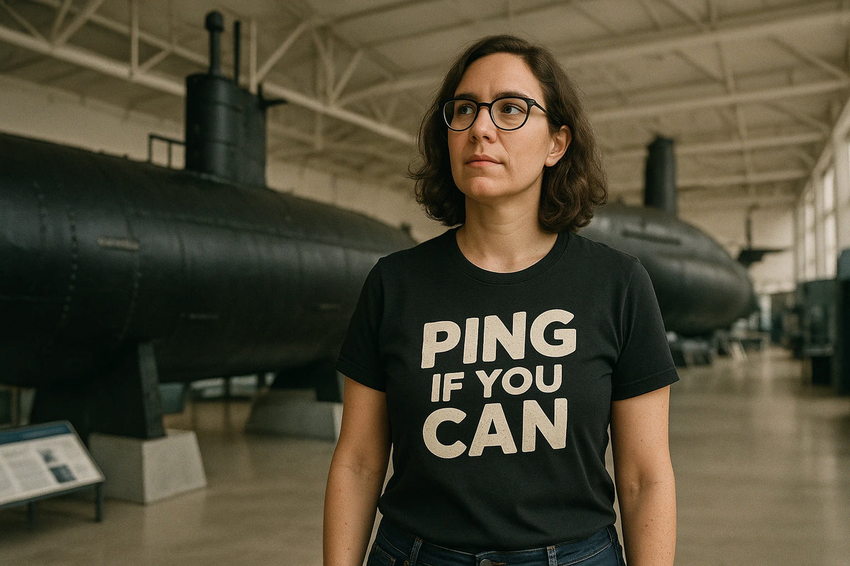 Lifestyle shot of the "Ping If You Can" black submarine tee shirts in a real-world setting