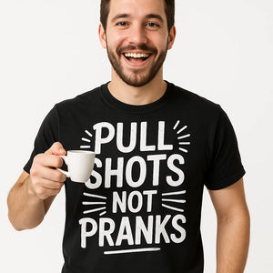 Close-up of the "Pull Shots Not Pranks" white print on a premium Bella+Canvas black espresso t shirt
