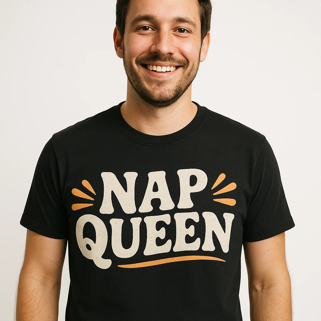 Close-up of the "Nap Queen" beige print on a premium Bella+Canvas black relaxing shirts