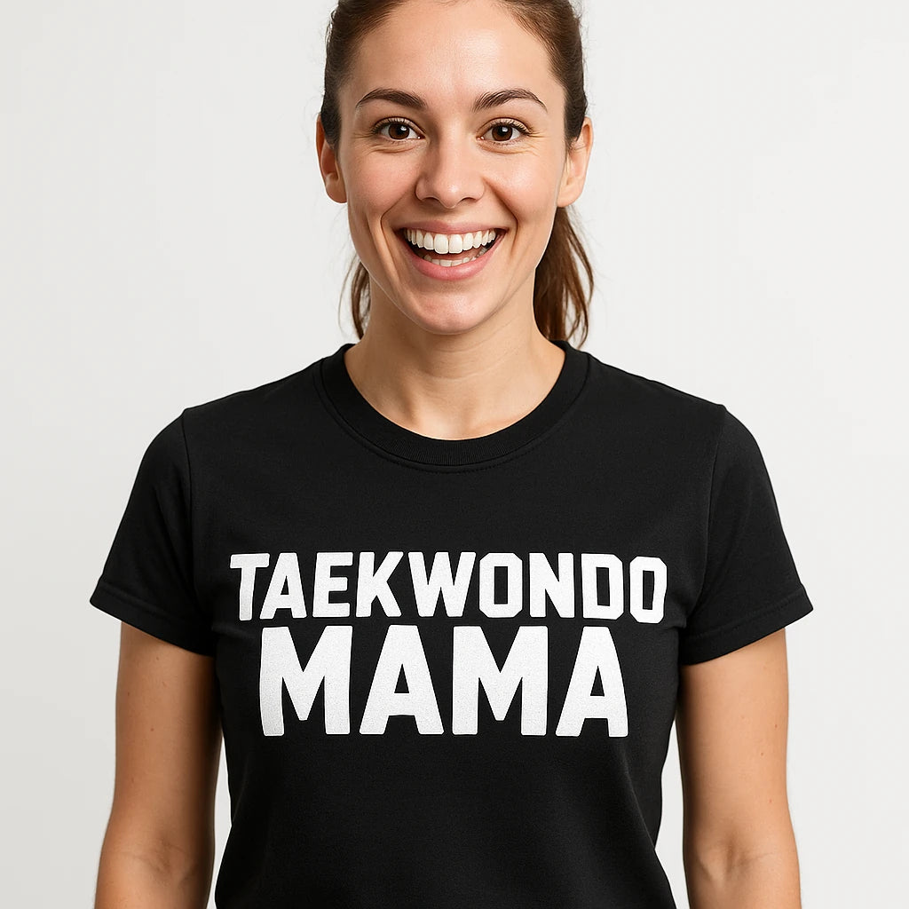 Close-up of the "Taekwondo Mama" white print on a premium Bella+Canvas black t shirt martial arts