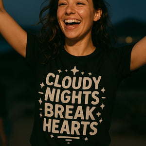 "Cloudy Nights Break Hearts" black stargazing t shirt, photographed as gifts for stargazing lovers
