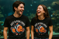 A man and a woman are laughing together, both wearing black t-shirts with a colorful clownfish illustration and the text 