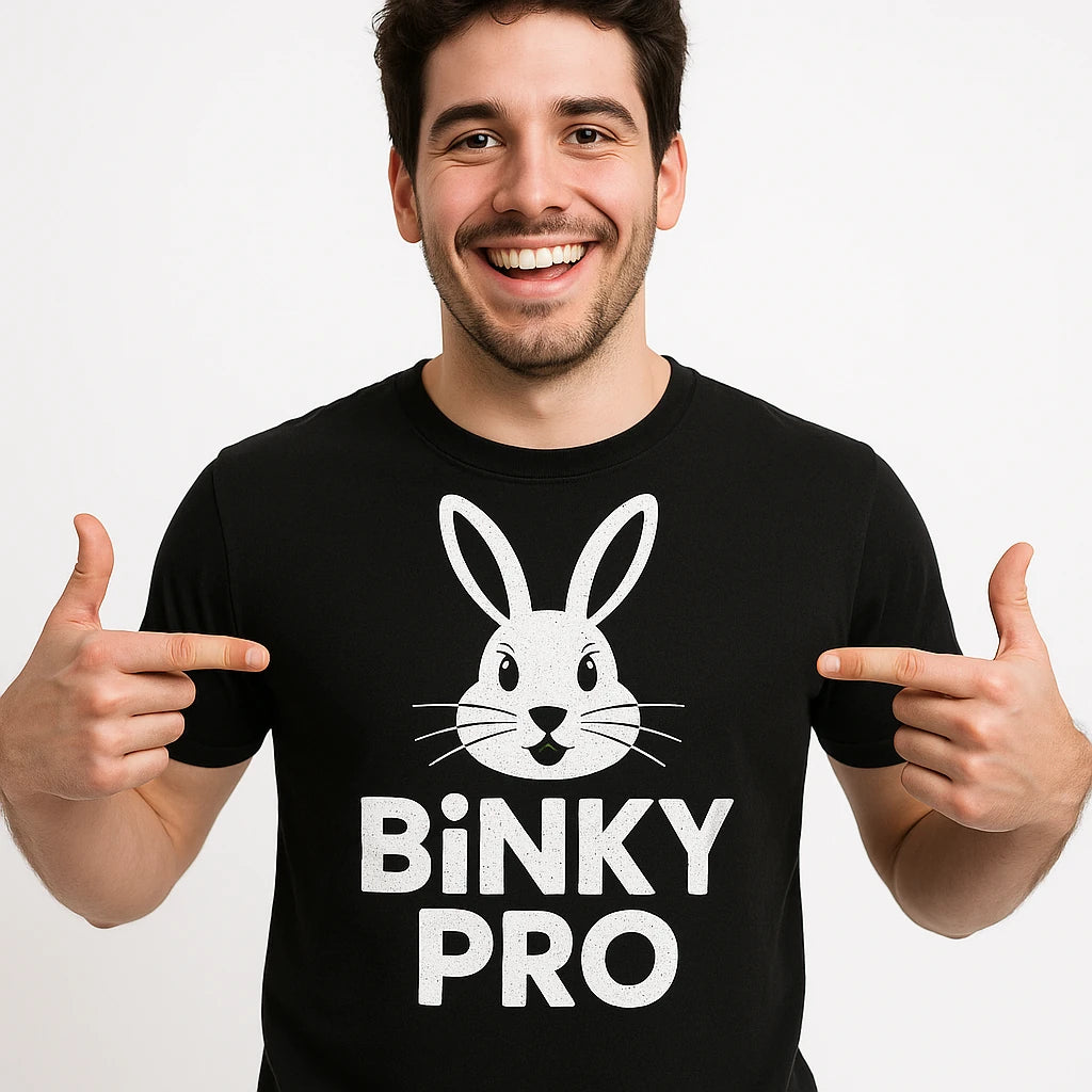 Close-up of the "Binky Pro" white print on a premium Bella+Canvas black rabbit shirts