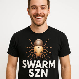 Close-up of the "Swarm Szn" white print on a premium Bella+Canvas black termite shirts