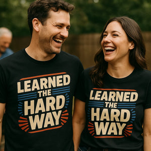 Person wearing the black dad shirts graphic tee - "Learned the Hard Way" design