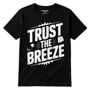 Black Kite Flying T Shirt - "Trust the Breeze" graphic tee with white print, flat lay product photo