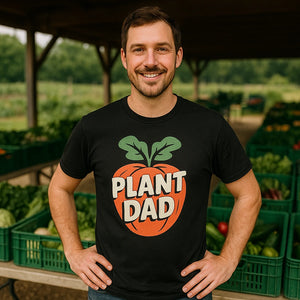 Lifestyle shot of the "Plant Dad" black vegetable t shirt in a real-world setting