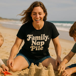 Lifestyle shot of the "Family Nap Pile" black family life t shirt in a real-world setting