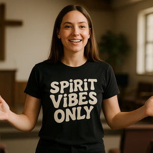Lifestyle shot of the "Spirit Vibes Only" black faith shirts for men in a real-world setting